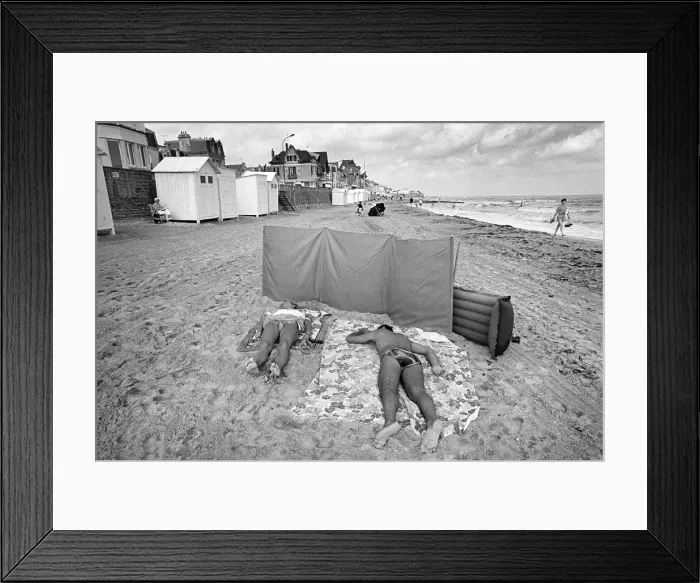 Framed Print : Sunbathers on the beach at Langrune Sur Mar, Normandy Framed Print : Sunbathers on the beach at Langrune Sur Mar, Normandy