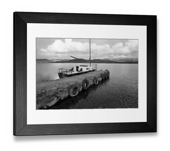 Framed Print : A yacht tied up to a pier on Bala Lake, Gwynedd. North Wales Framed Print : A yacht tied up to a pier on Bala Lake, Gwynedd. North Wales