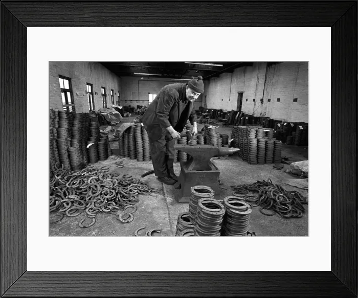 Framed Print : The owner of Birminghams last horseshoe factory at work Framed Print : The owner of Birminghams last horseshoe factory at work