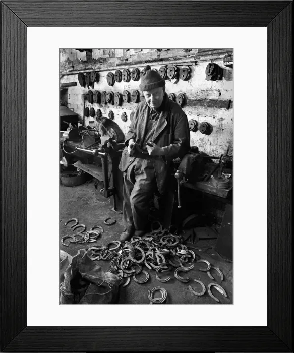 Framed Print : The owner of Birminghams last horseshoe factory at work Framed Print : The owner of Birminghams last horseshoe factory at work