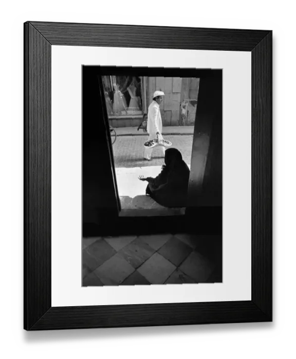 Framed Print : A woman beggar sits in a church doorway, Cadiz, Spain Framed Print : A woman beggar sits in a church doorway, Cadiz, Spain