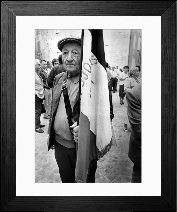 Framed Print : An elderly man takes a break from a street parade in Quercy Framed Print : An elderly man takes a break from a street parade in Quercy