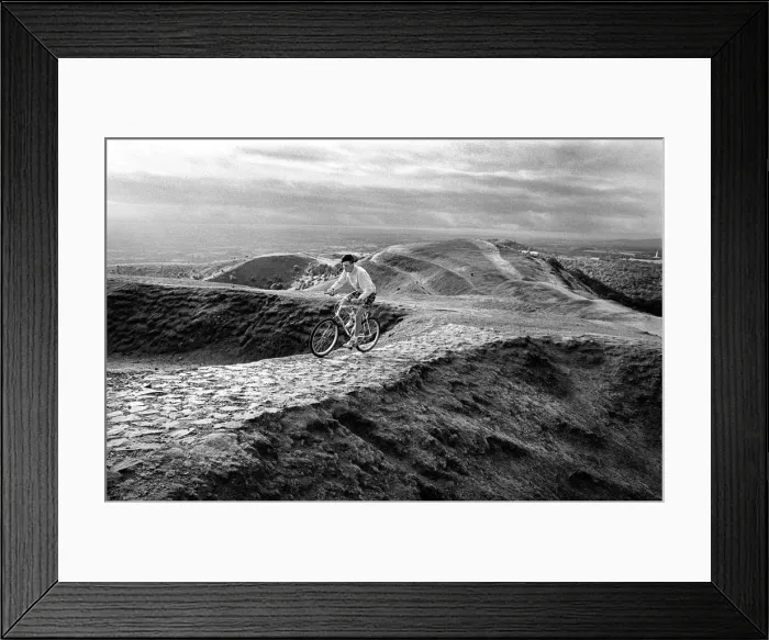 Framed Print : Cyclist on the Malvern Hills above Droitwich, Worcs Framed Print : Cyclist on the Malvern Hills above Droitwich, Worcs