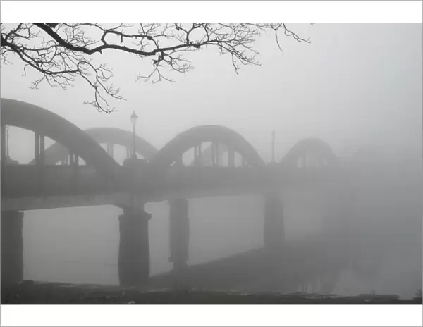Thick fog on the concrete bridge over the River Dee