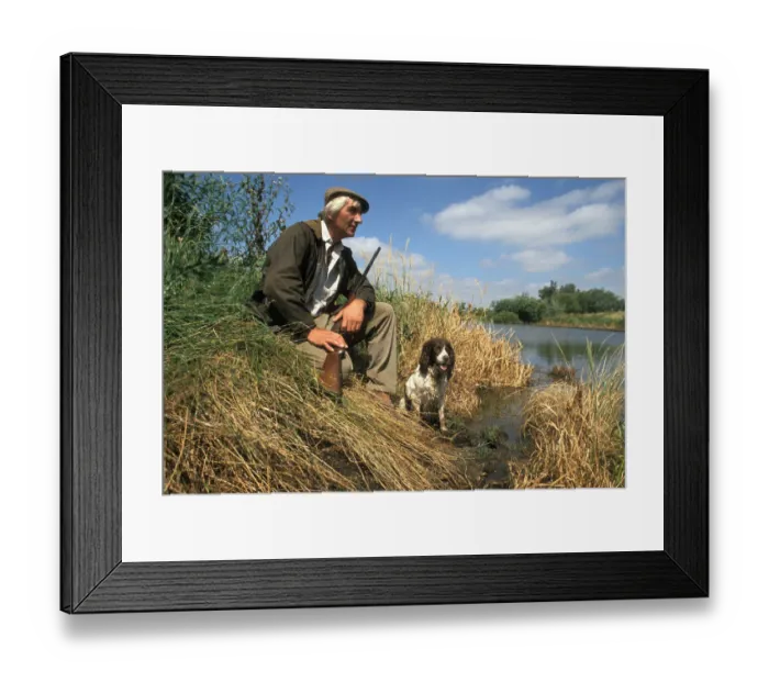 Framed Print : Poacher with gun and dog, Cambridgeshire fens Framed Print : Poacher with gun and dog, Cambridgeshire fens