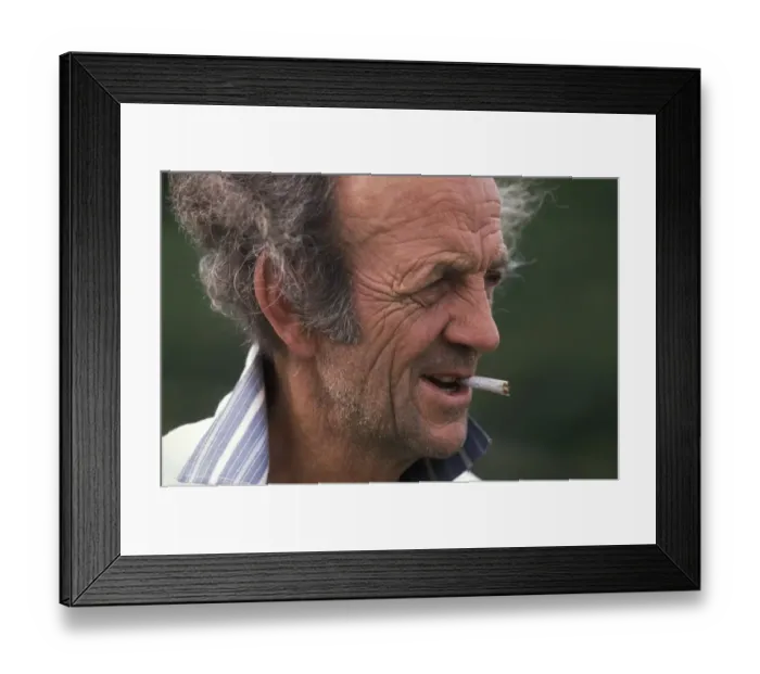 Framed Print : Profile portrait of male poacher with cigarette in his mouth Framed Print : Profile portrait of male poacher with cigarette in his mouth