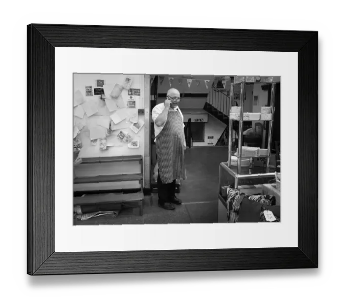 Framed Print : Market trader on mbile phone, Shrewsbury Indoor Market Framed Print : Market trader on mbile phone, Shrewsbury Indoor Market