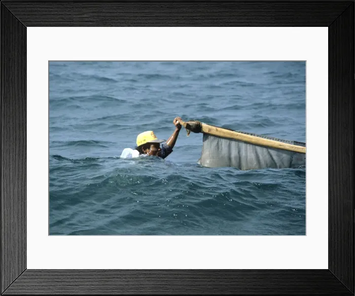 Framed Print : Bali fisherman up to his neck in water Framed Print : Bali fisherman up to his neck in water