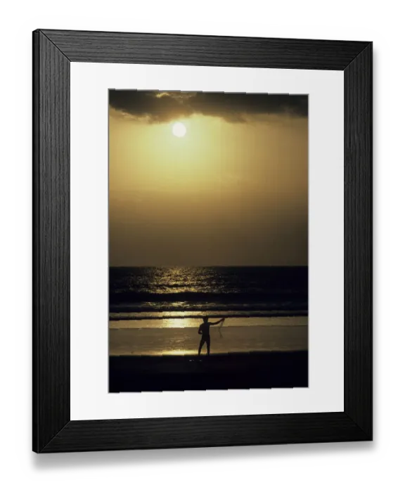 Framed Print : Bali fisherman silhouetted against the golden sea and sunset Framed Print : Bali fisherman silhouetted against the golden sea and sunset