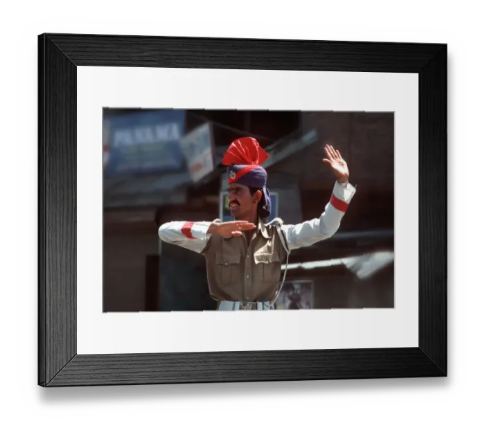 Framed Print : Kashmiri policeman on traffic duty in Srinagar, Kashmir Framed Print : Kashmiri policeman on traffic duty in Srinagar, Kashmir