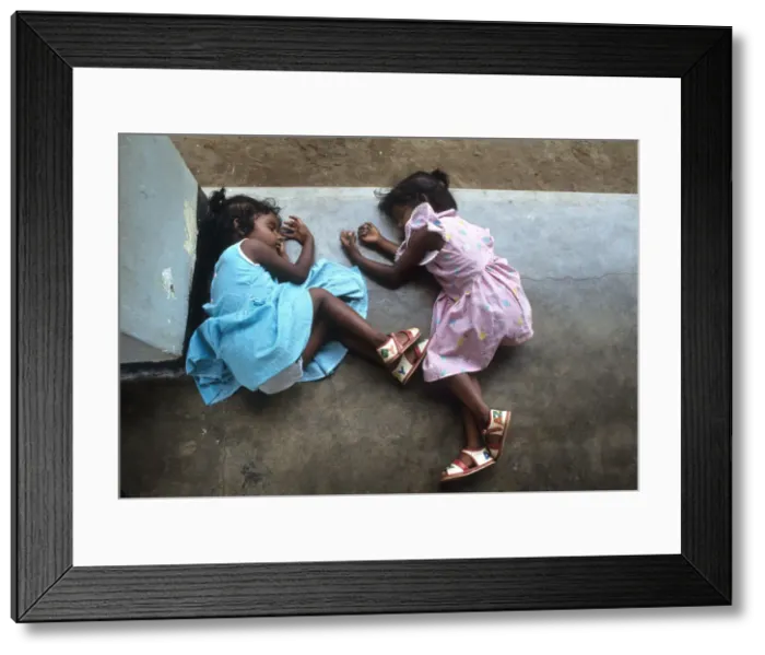 Framed Print : Small children take a nap during the afternoon, Sri Lanka Framed Print : Small children take a nap during the afternoon, Sri Lanka