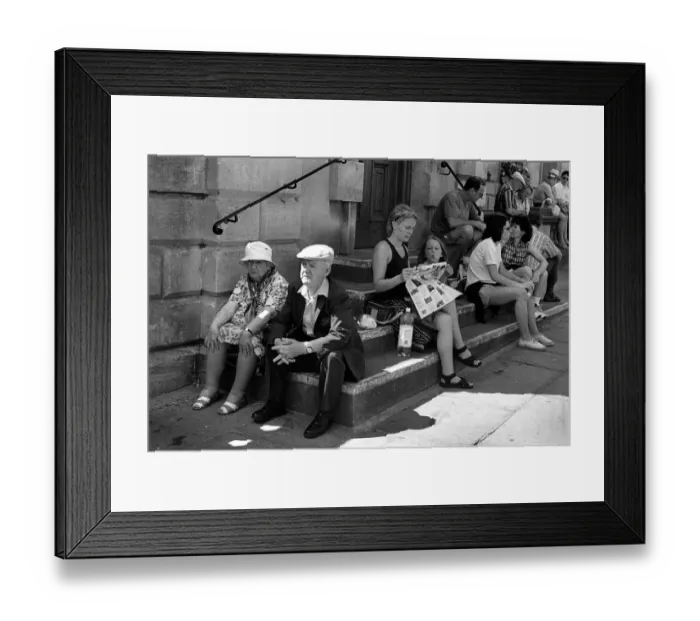 Framed Print : An elderly couple sitting on steps outside Bath Abbey Framed Print : An elderly couple sitting on steps outside Bath Abbey