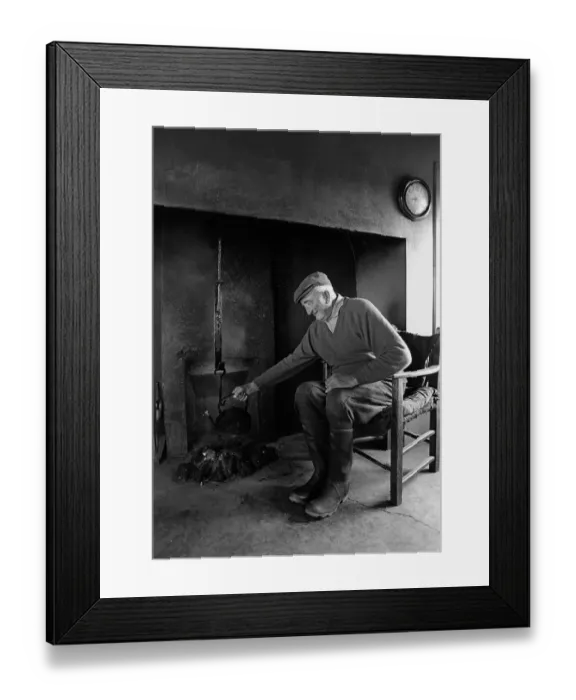 Framed Print : A farmer sits in the farm kitchen, Co Clare, Ireland Framed Print : A farmer sits in the farm kitchen, Co Clare, Ireland