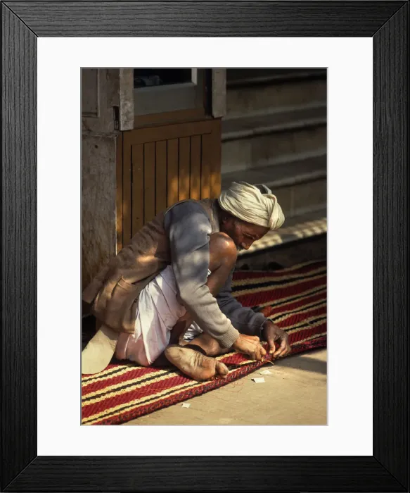 Framed Print : Carpet maker stitches the hem of a striped carpet, Rajasthan Framed Print : Carpet maker stitches the hem of a striped carpet, Rajasthan
