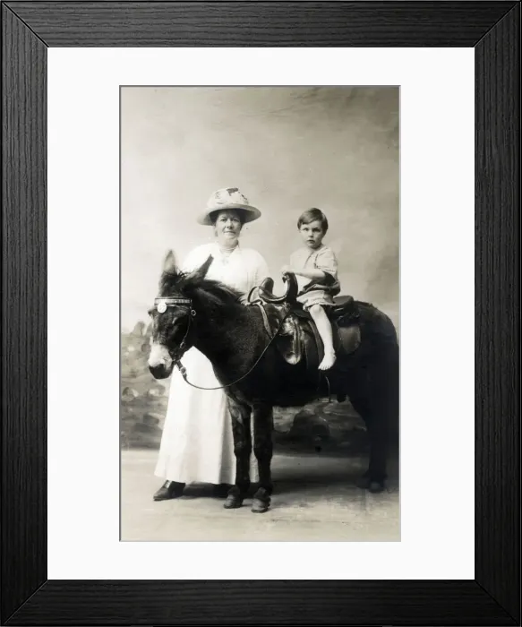 Framed Print : Young Boy and his Mother - Studio photo on a donkey Framed Print : Young Boy and his Mother - Studio photo on a donkey