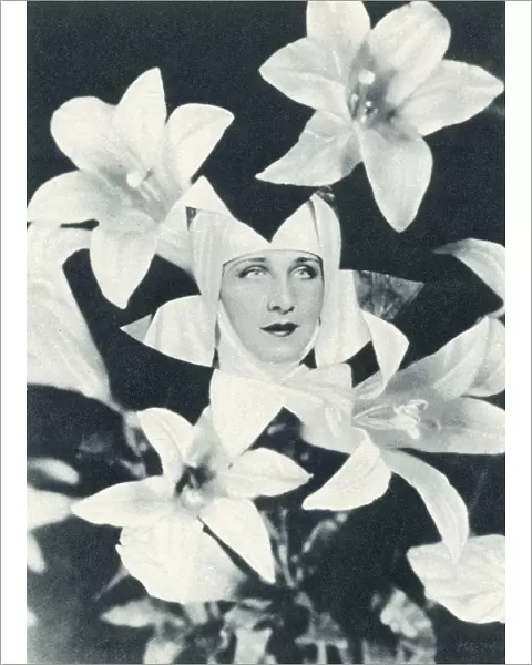 Norma Shearer among the Lilies - Screen Celebrities - from a New Angle