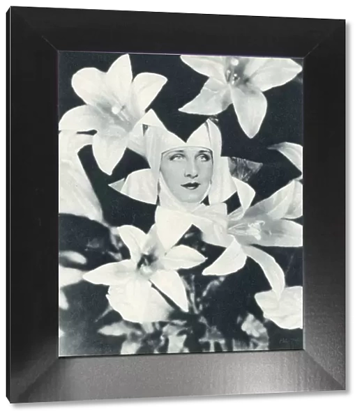 Norma Shearer among the Lilies - Screen Celebrities - from a New Angle
