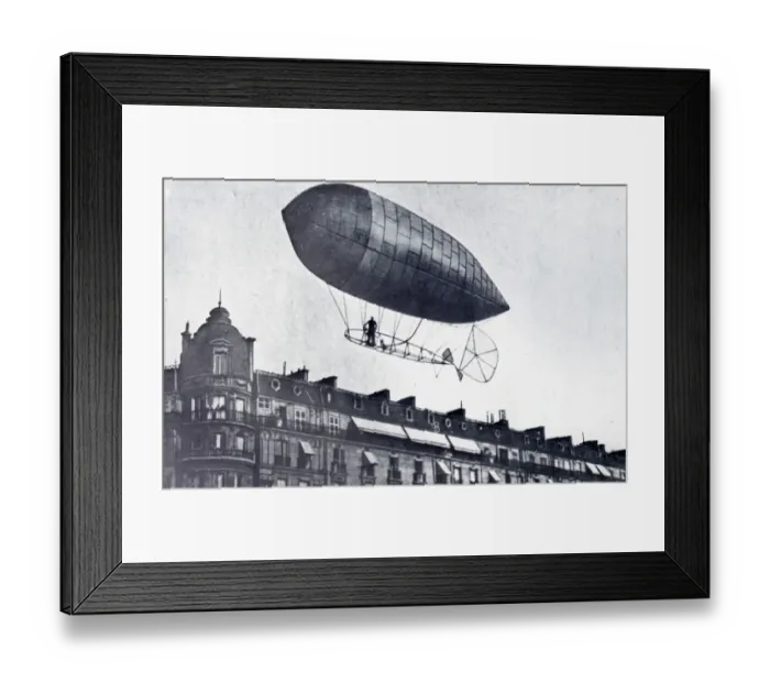 Framed Print : Santos-Dumont Airship No. 9 in flight above buildings