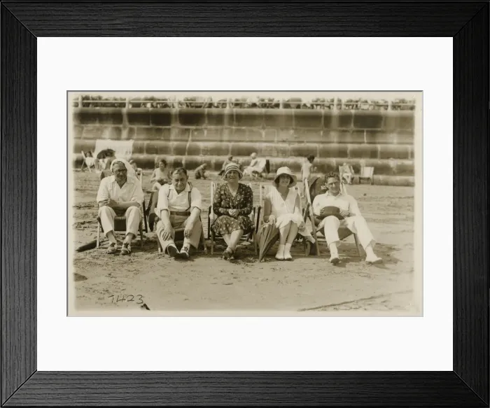 Framed Print : A lovely group photo of five friends (or relatives) sitting on deckchairs on the beach
