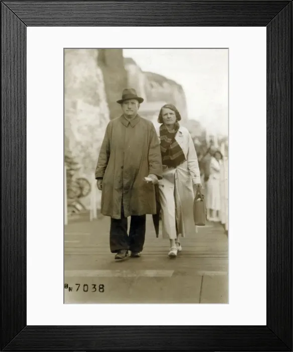 Framed Print : Couple walking below the cliffs at Cliftonville, Kent Framed Print : Couple walking below the cliffs at Cliftonville, Kent