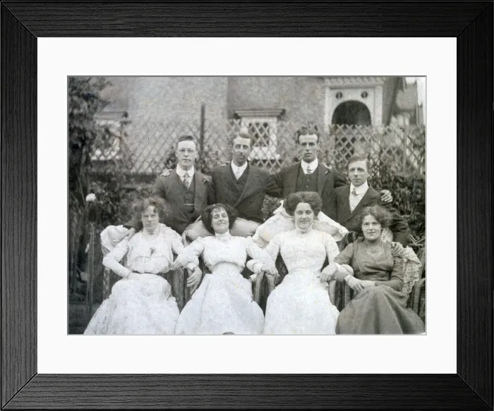 Framed Print : Four couples posing for a photograph in a suburban garden Framed Print : Four couples posing for a photograph in a suburban garden