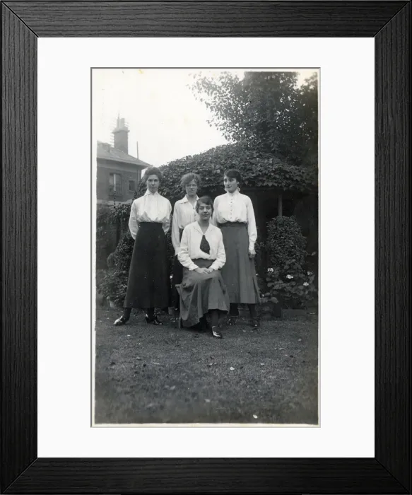 Framed Print : Four student friends posing for a group photograph