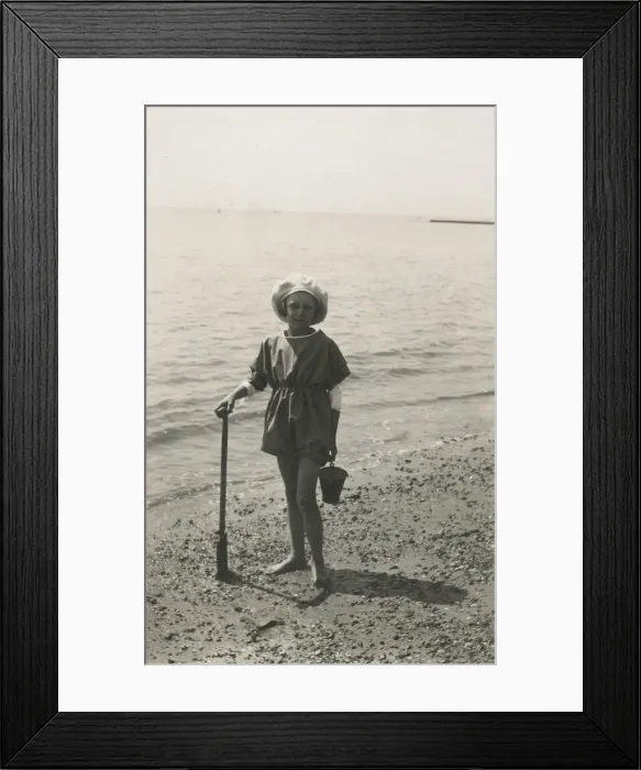 Framed Print : British girl with a bucket and spade - waters edge Framed Print : British girl with a bucket and spade - waters edge