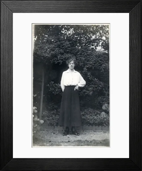 Framed Print : Female student in a suburban garden Framed Print : Female student in a suburban garden