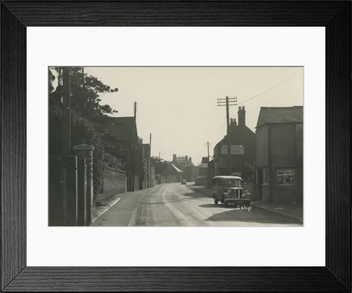 Framed Print : The Bell Inn and High Street Framed Print : The Bell Inn and High Street