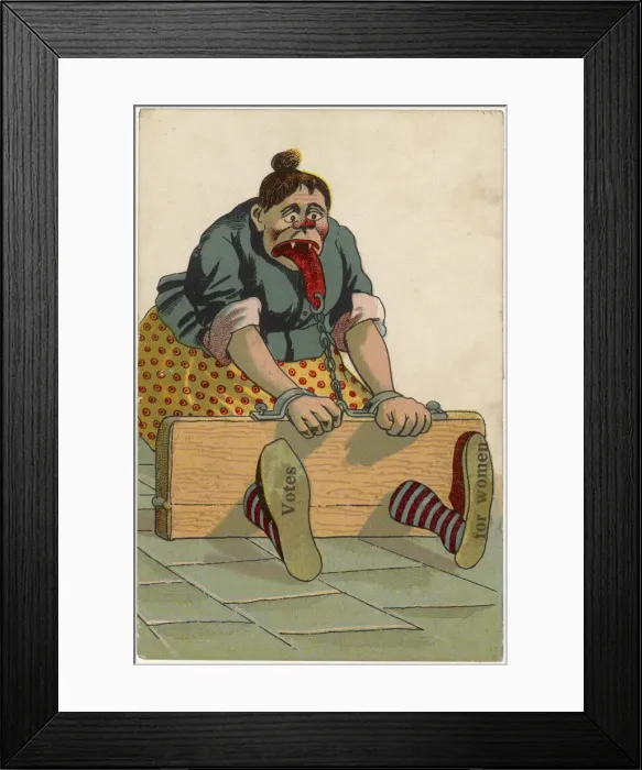 Framed Print : Suffragette woman in the stocks, unsympathetic cartoon Framed Print : Suffragette woman in the stocks, unsympathetic cartoon