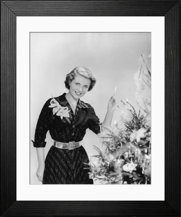 Framed Print : PUTTING CANDLES ON TREE Framed Print : PUTTING CANDLES ON TREE