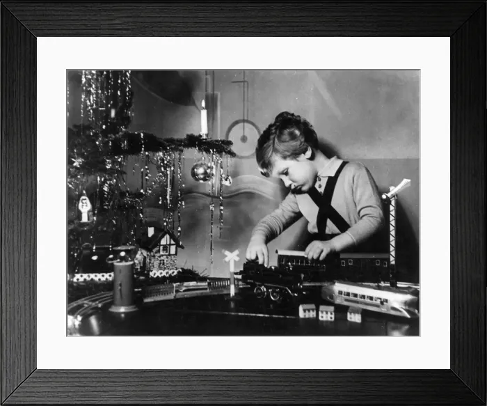 Framed Print : GIRL WITH TOY TRAIN SET Framed Print : GIRL WITH TOY TRAIN SET