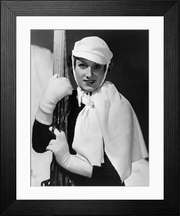 Framed Print : SKI-WEAR. A lady skier models matching accessories of white gauntlets Framed Print : SKI-WEAR. A lady skier models matching accessories of white gauntlets