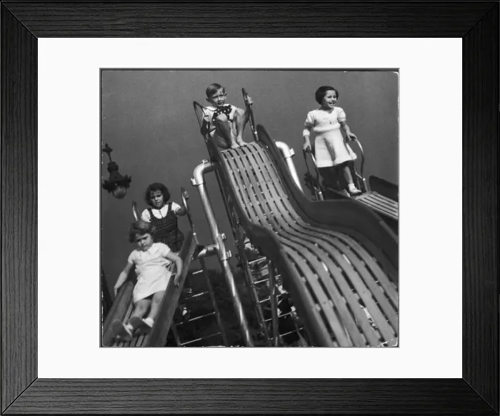 Framed Print : CHILDREN PLAY ON SLIDES Framed Print : CHILDREN PLAY ON SLIDES
