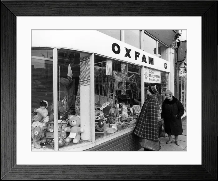 Framed Print : WINDOW SHOPPING / OXFAM Framed Print : WINDOW SHOPPING / OXFAM