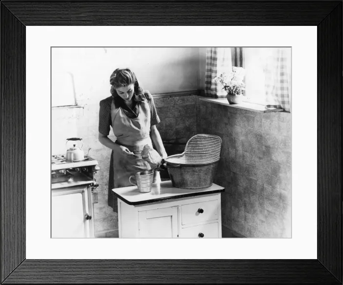 Framed Print : WOMAN PREPARES TO DYE Framed Print : WOMAN PREPARES TO DYE