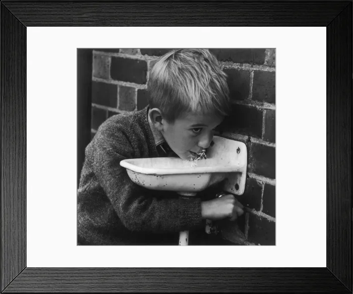 Framed Print : BOY AT DRINKING FOUNTAIN Framed Print : BOY AT DRINKING FOUNTAIN