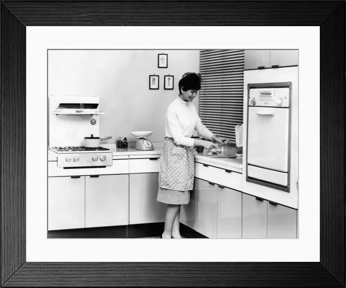 Framed Print : HOUSEWIFE IN KITCHEN Framed Print : HOUSEWIFE IN KITCHEN