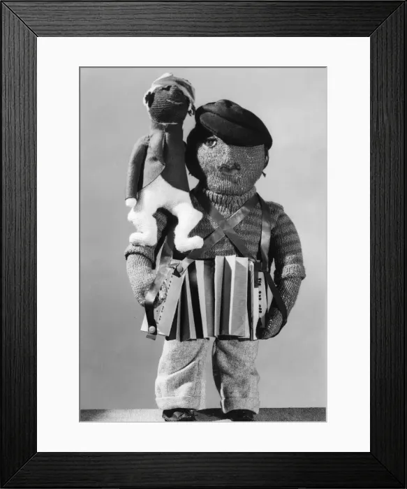 Framed Print : KNITTED CONCERTINA MAN Framed Print : KNITTED CONCERTINA MAN
