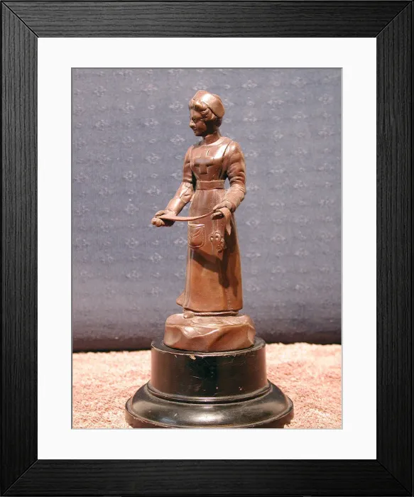 Framed Print : Statuette of a WWI nurse Framed Print : Statuette of a WWI nurse