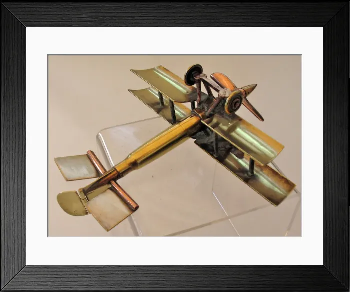 Framed Print : WWI biplane bullet fuselage with copper propeller Framed Print : WWI biplane bullet fuselage with copper propeller
