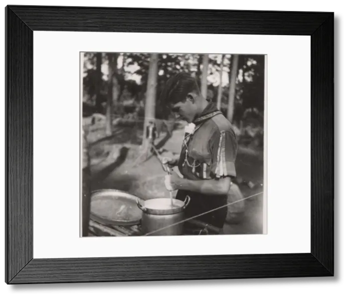 Framed Print : German boy scout cooking at camp Framed Print : German boy scout cooking at camp