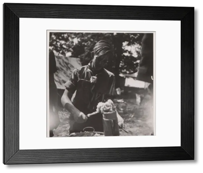 Framed Print : German boy scout cooking at camp Framed Print : German boy scout cooking at camp