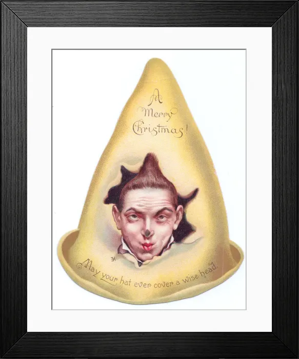 Framed Print : Clowns face on a hat-shaped Christmas card Framed Print : Clowns face on a hat-shaped Christmas card