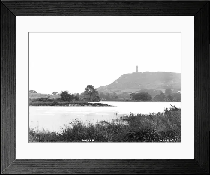 Framed Print : Scrabo - a view of the tower with water in the foreground Framed Print : Scrabo - a view of the tower with water in the foreground