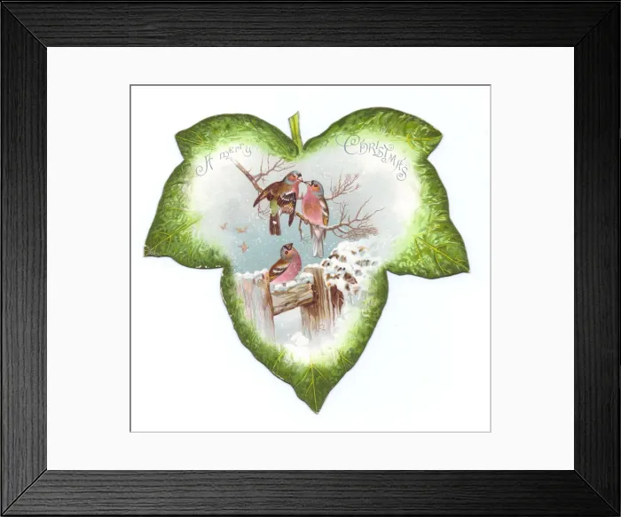 Framed Print : Christmas card in the shape of a green leaf with birds Framed Print : Christmas card in the shape of a green leaf with birds