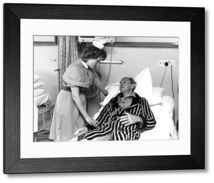 Framed Print : Nurse with elderly patient Framed Print : Nurse with elderly patient