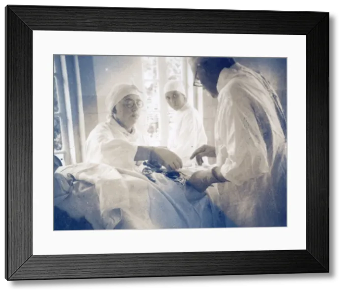 Framed Print : Nurses assisting doctor during surgery Framed Print : Nurses assisting doctor during surgery