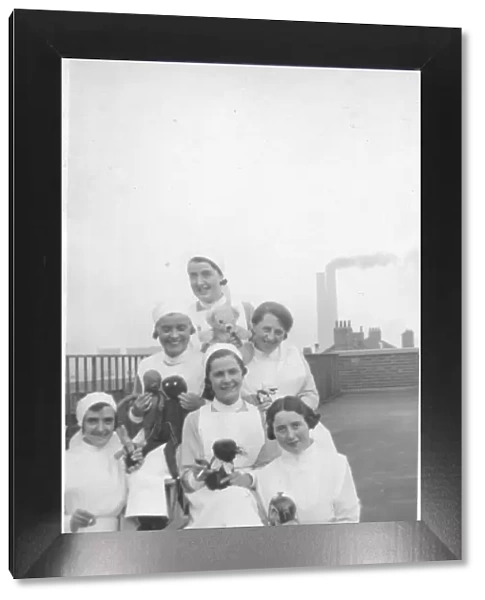 Group of nurses with toys