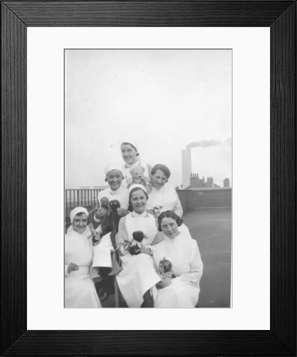 Framed Print : Group of nurses with toys Framed Print : Group of nurses with toys